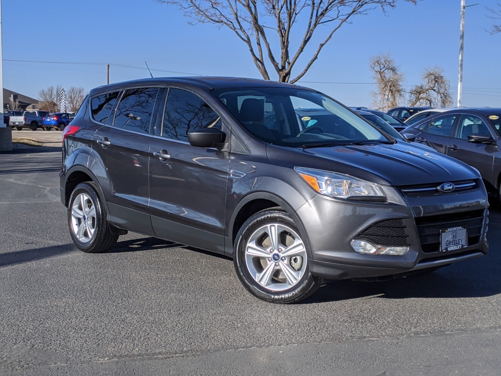 Pre-Owned 2015 Ford Escape SE Sport Utility in Greeley #20H210C | Honda